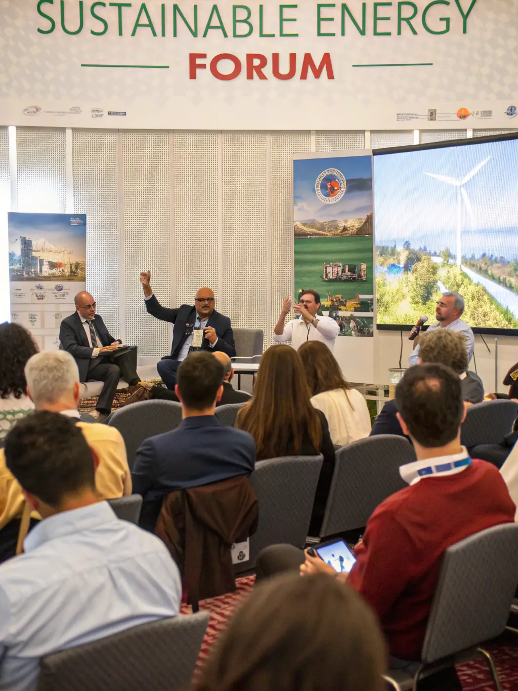 A photograph of a panel discussion at the 'Sustainable Tech Forum', featuring experts discussing eco-friendly technology solutions.